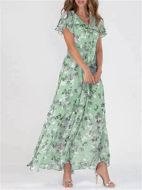 Maxi-jurk met bloemen en ruches aan de mouwen