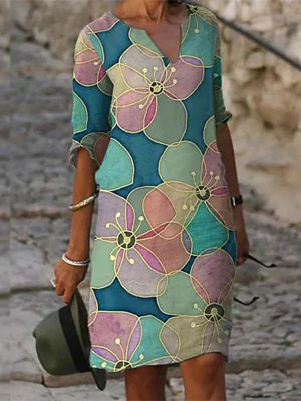 Robe droite crème brodée de fleurs à col en V