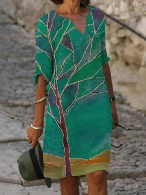 Abito a trapezio con scollo a V ricamato floreale color crema