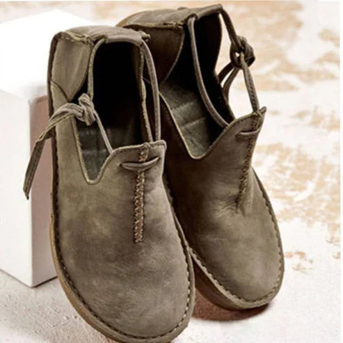 Stivaletti con cerniera con nappe