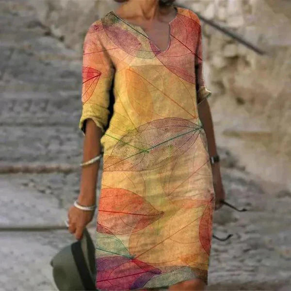 Robe droite crème brodée de fleurs à col en V