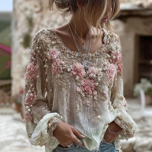 Blusa con apliques de encaje floral 3D