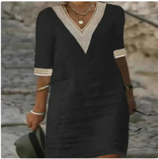 Abito a trapezio con scollo a V e finiture all'uncinetto