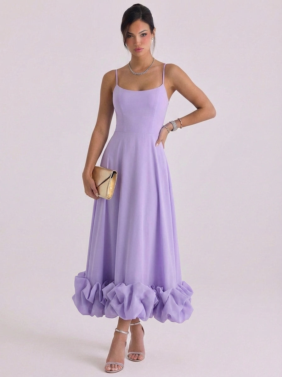 Vestido largo de gasa con dobladillo de roseta