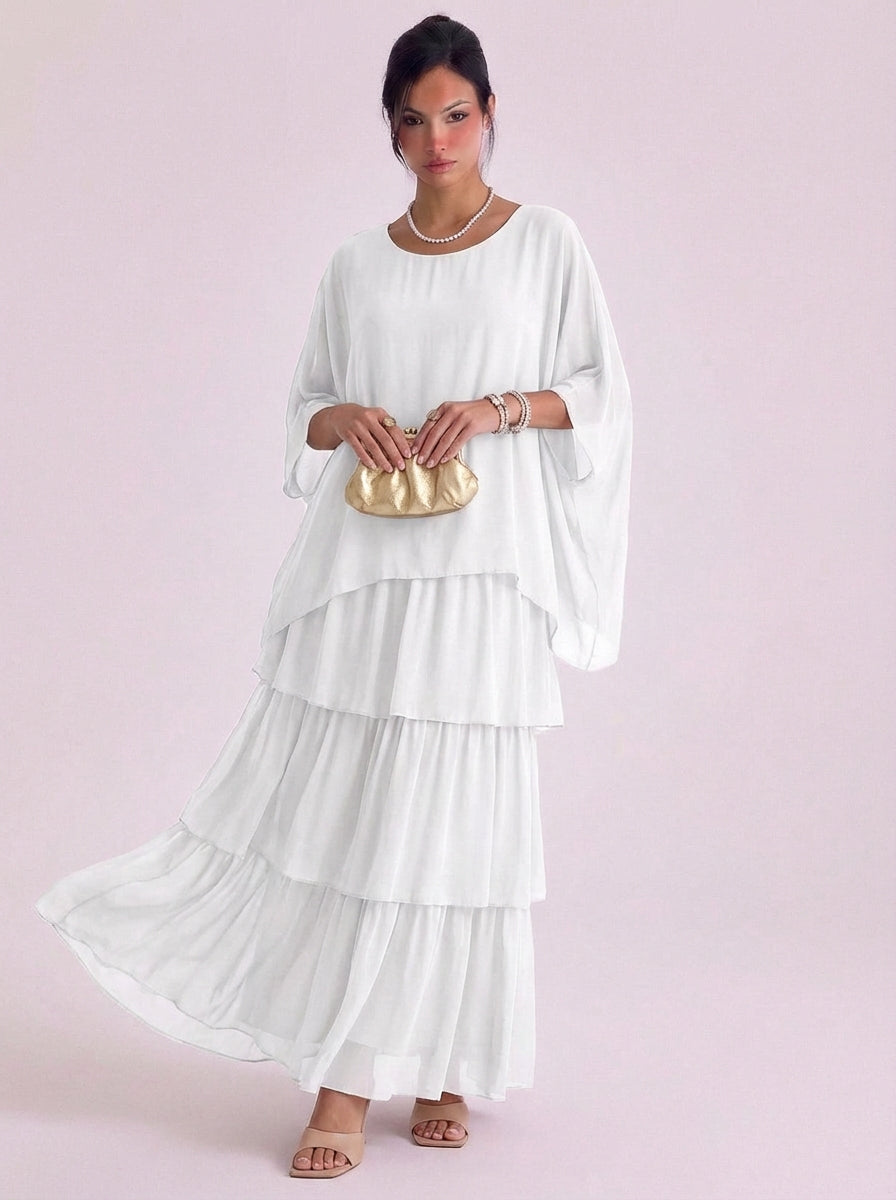 Top oversize con maxi abito in chiffon con volant a strati