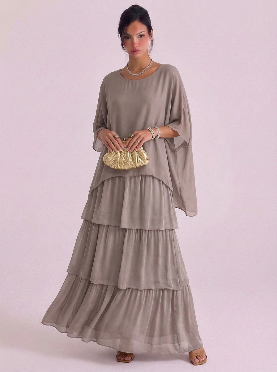 Top oversize con maxi abito in chiffon con volant a strati