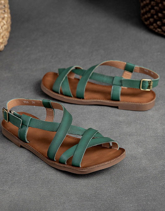 Sandalias planas con tiras