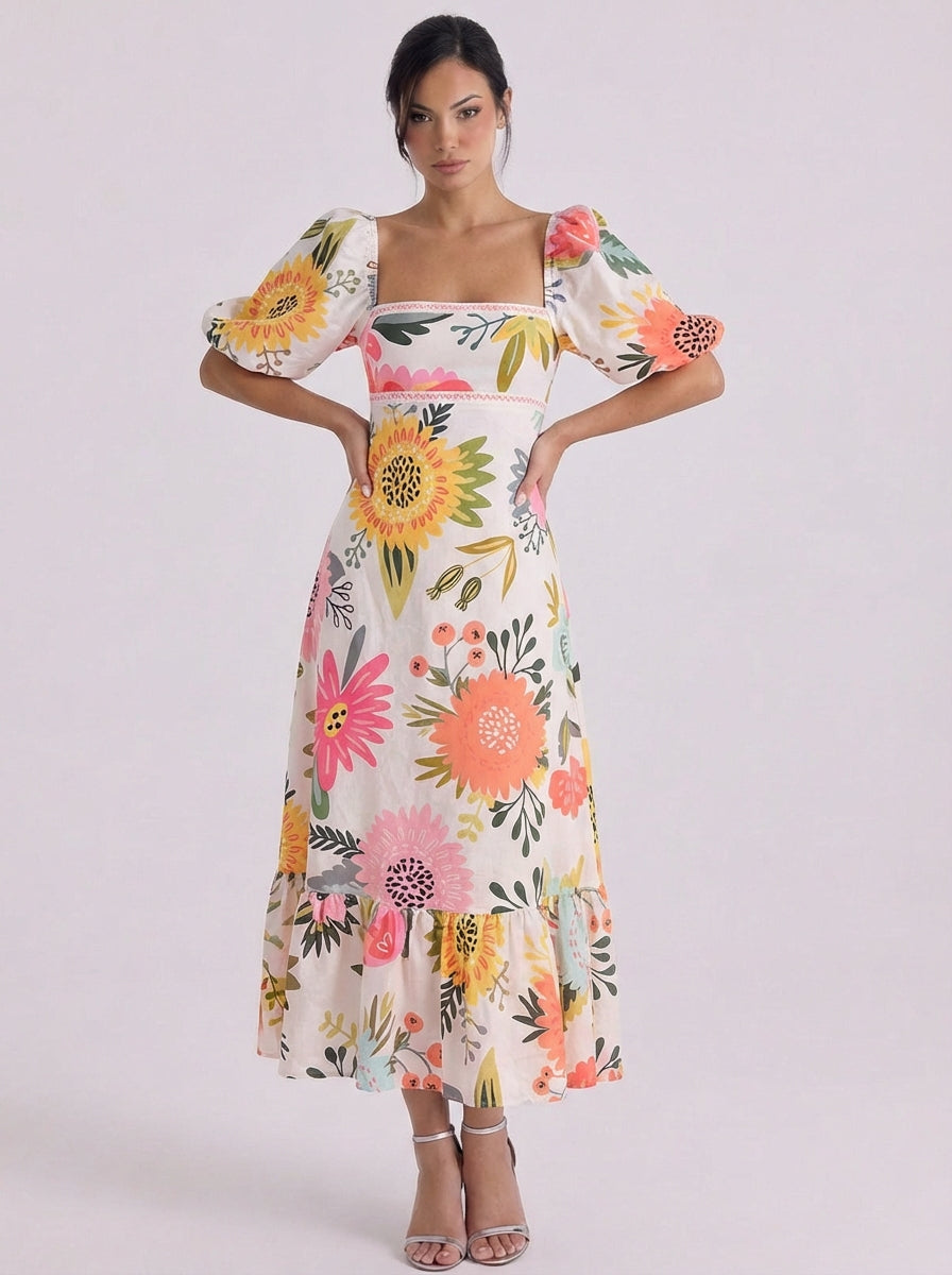 Robe mi-longue en coton à imprimé floral, manches bouffantes, ourlet à volants