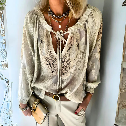 Blusa boho con cordones y detalles bordados