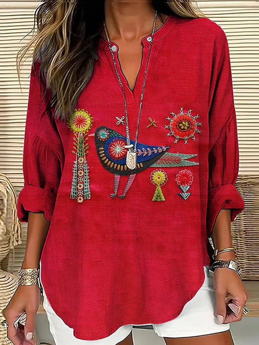 Blusa tipo túnica con bordado de pájaros populares