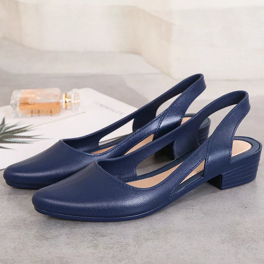 Zapatos planos elegantes con tira trasera