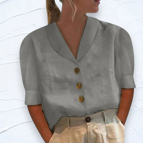 Blouse à col avec boutons et manches bouffantes