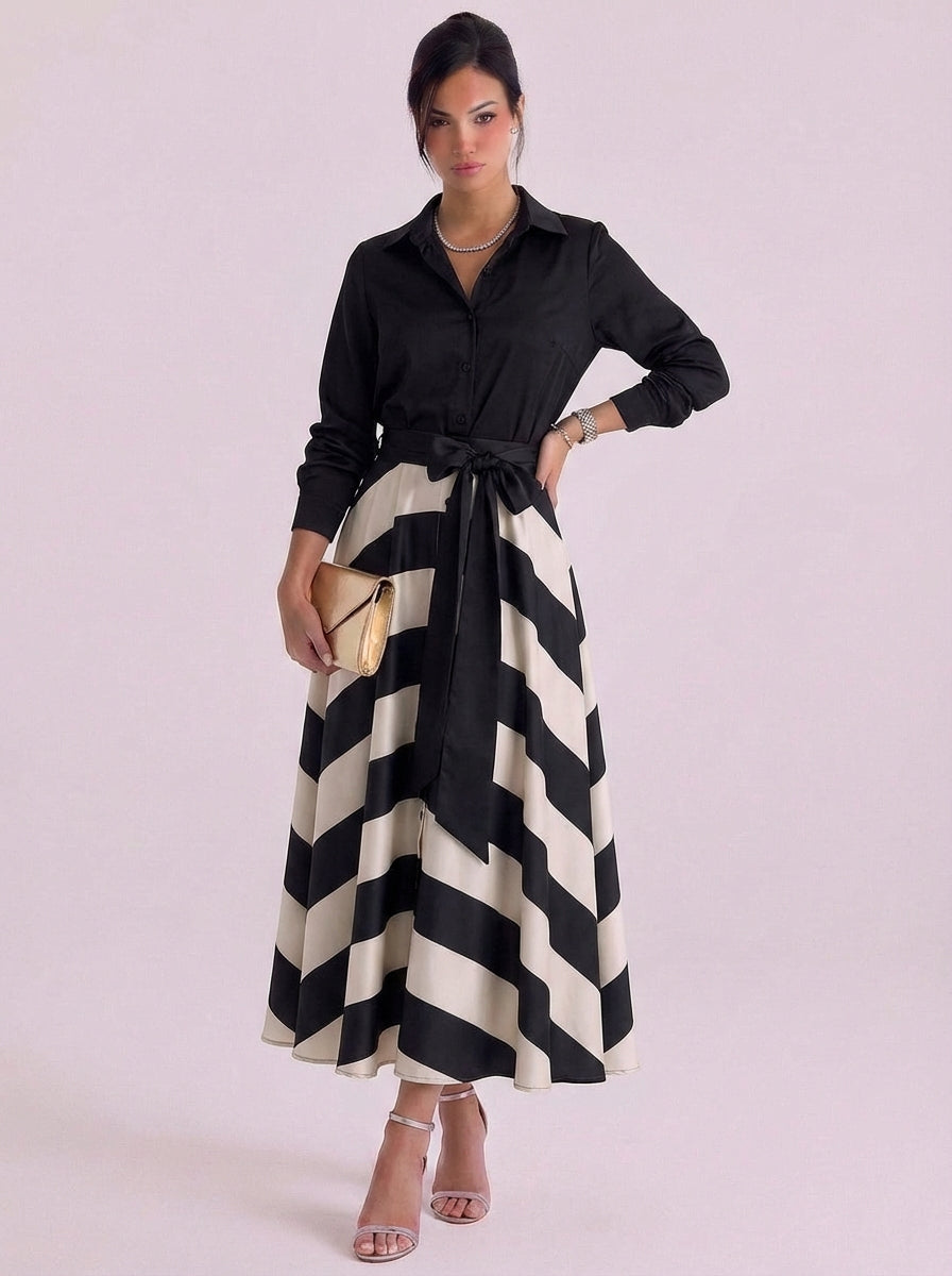 Abito lungo con bottoni in raso sul davanti e gonna a righe con cravatta in vita