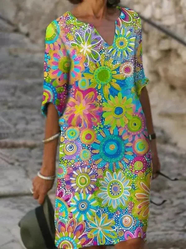 Levendige jurk met zonnebloemprint