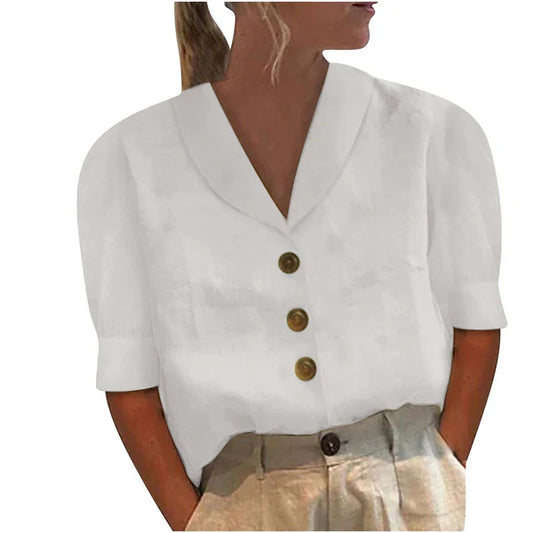 Blusa con cuello, detalle de botones y mangas abullonadas