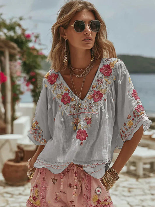 Top campesino con bordado floral de lino